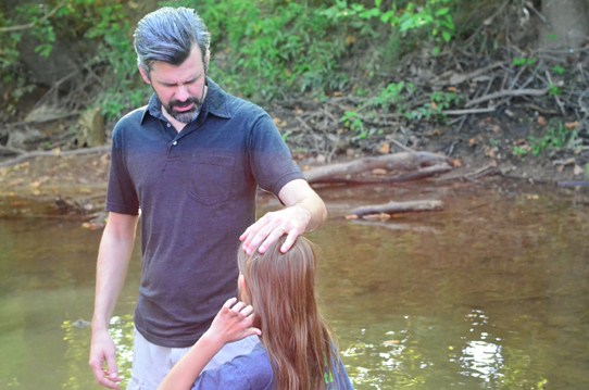 baptizing-in-creek