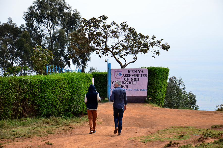 Shaun Groves walking with child in Kenya
